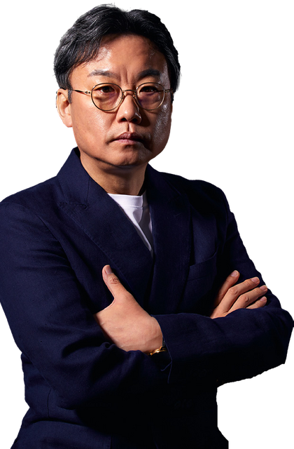 Eugene Kim (김유진), Korean restaurant business consultant, in a dark suit with arms crossed